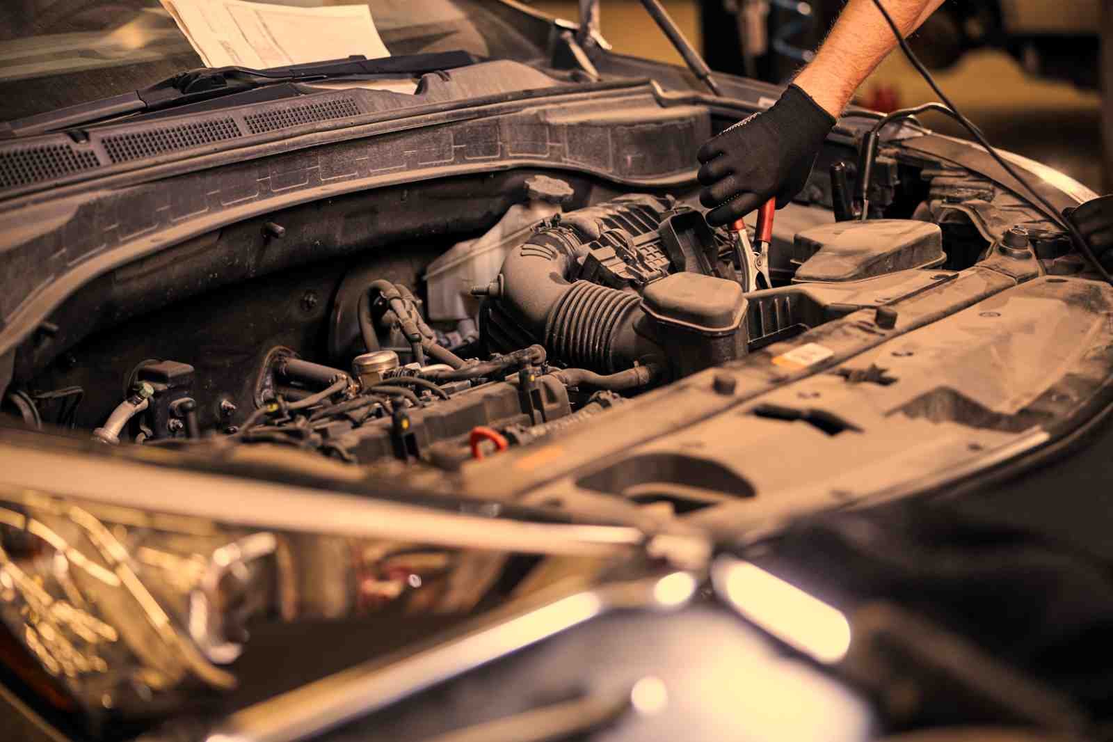 Mechanic diagnosing a vehicle engine